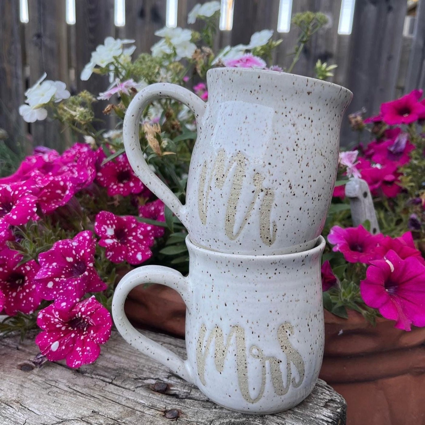 A matched pair of wedding mugs