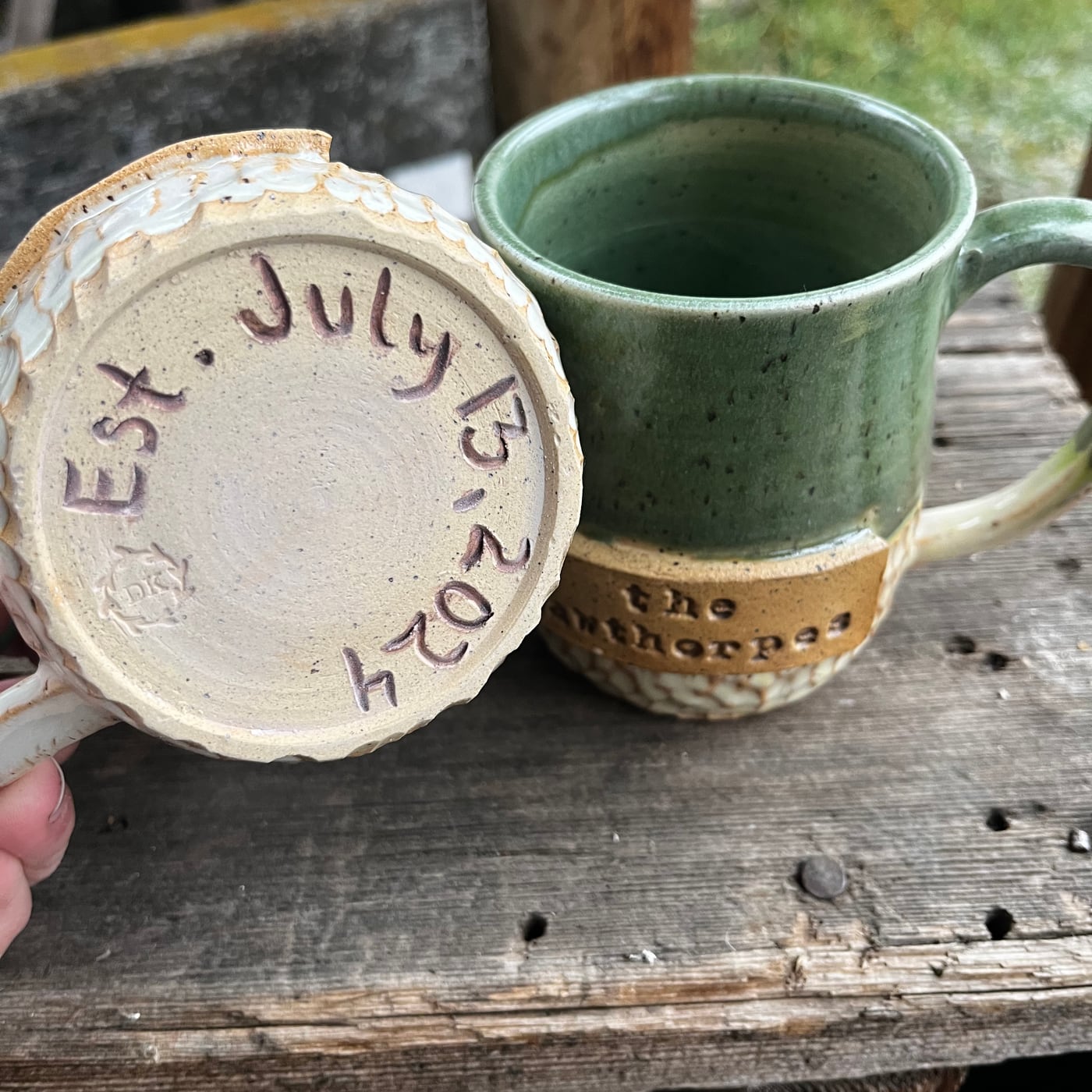 A matched pair of wedding mugs