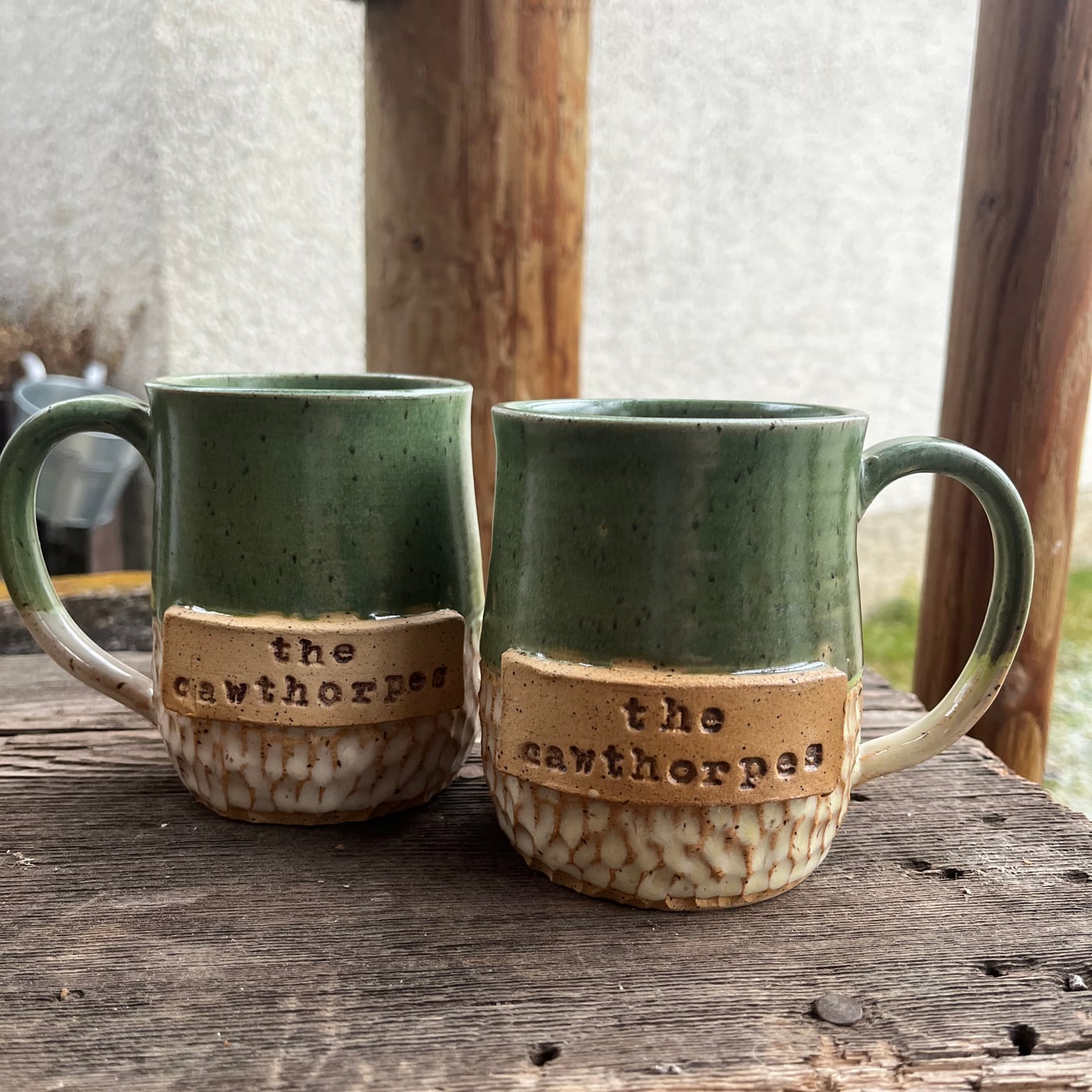 A matched pair of wedding mugs